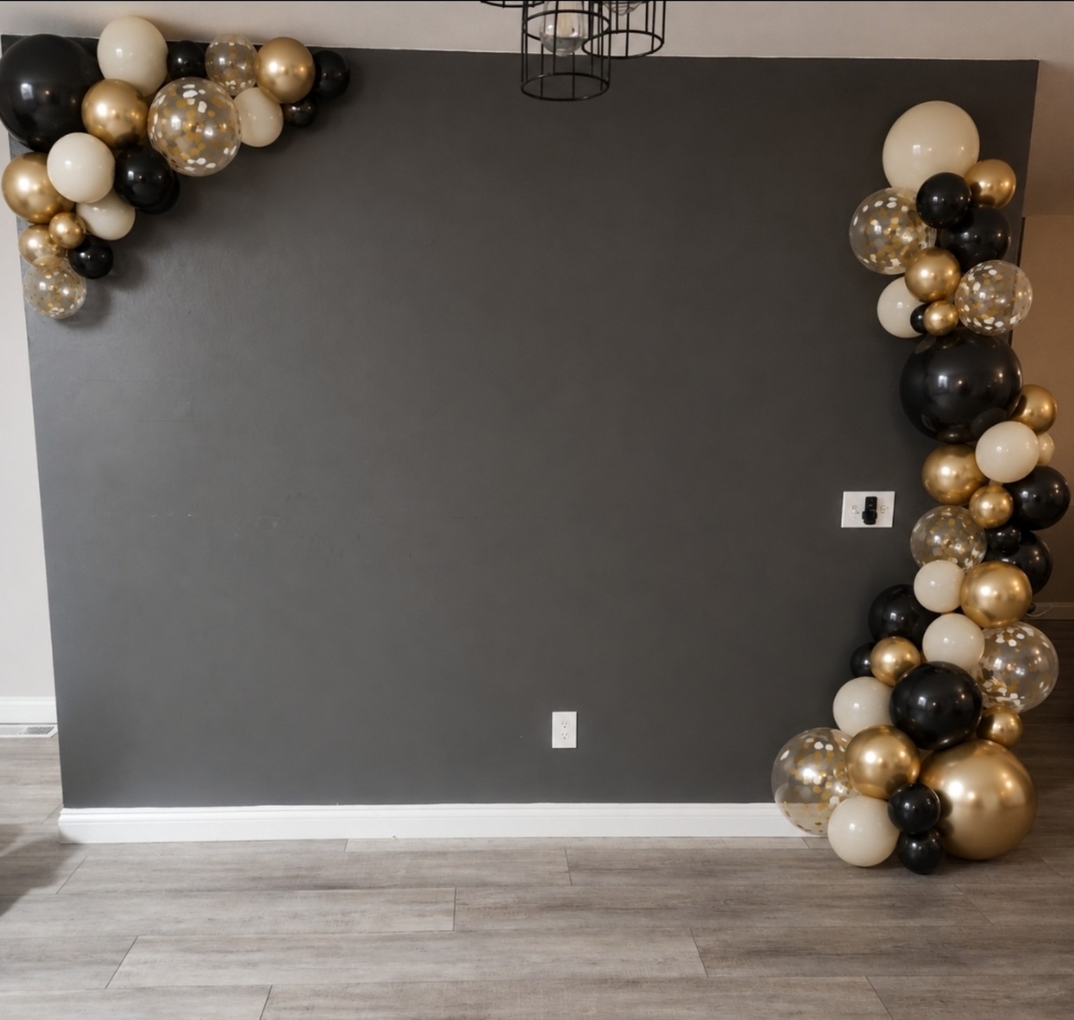 Black, gold, cream and confetti balloon arrangement concept