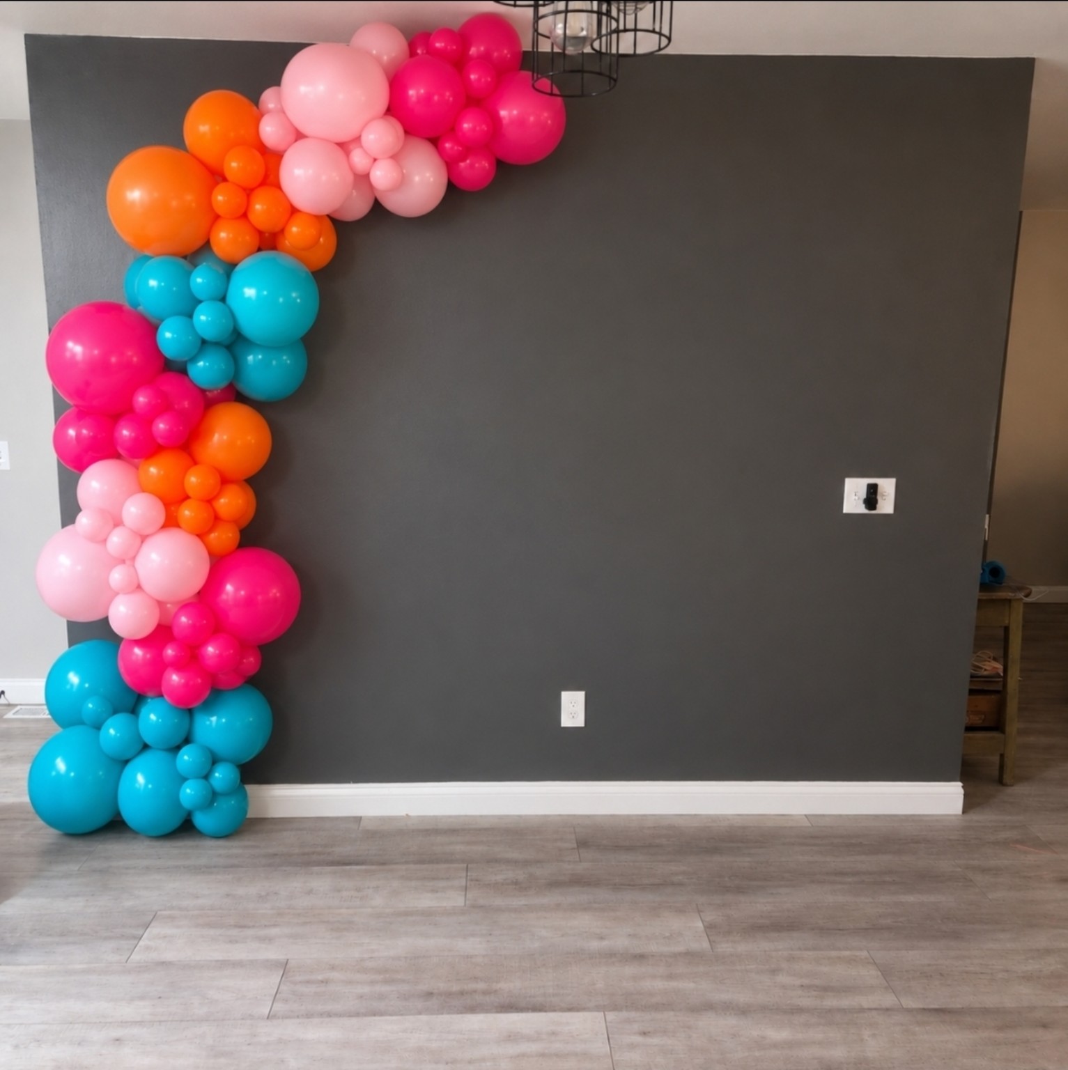 Bright pink, orange and turquoise balloon decor concept